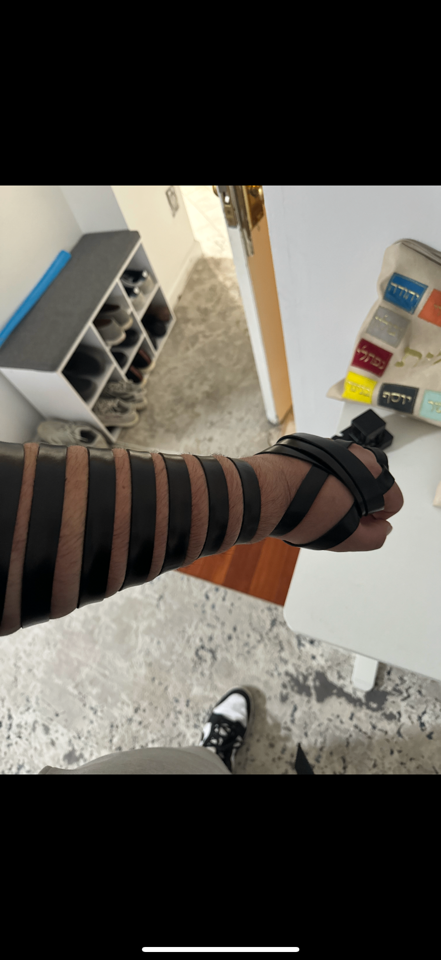 Tefillin practice at home entrance